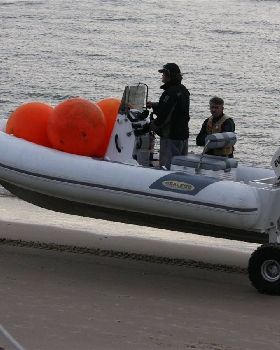 currumbin hobbie cat safety boat....... great engineering obm drives wheels also.....