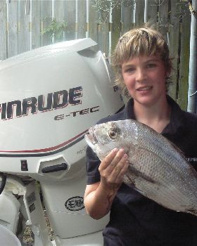 Luke with his first snapper...