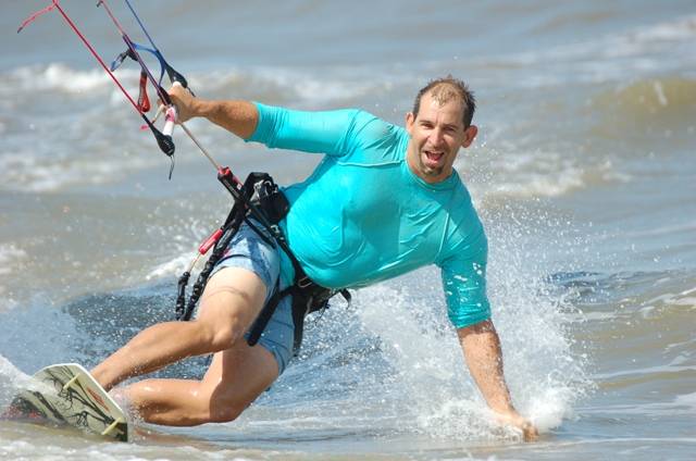 Shot of Chris Rose who owns the kite shop here