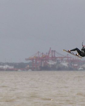 Ian - jumping the container terminal over a muddy bay