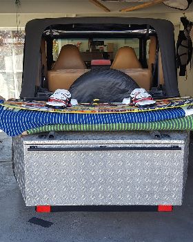 Jeep with a tool box off the back. Miss my van though