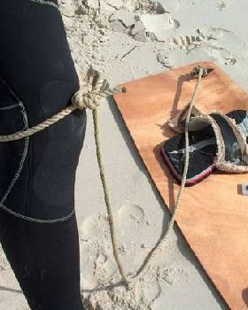 How NOT to wear a board leash.....
