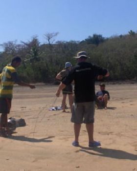 Damo our Fijian boat driver Helps Tony do lines