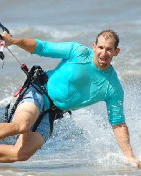 Shot of Chris Rose who owns the kite shop here