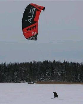 Snow kiting somewhere in a Northern Territory