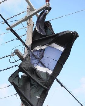 Kite up a power pole