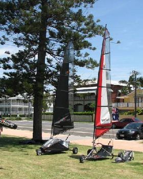 The 2008 Pro model with black 5.5m sail and an older Pro model with red 5.5m sail.
