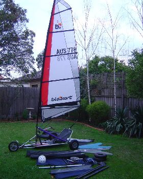 Blokart assembled with extra gear on floor