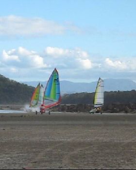 Exploring Midge Point- raceing the tide home!