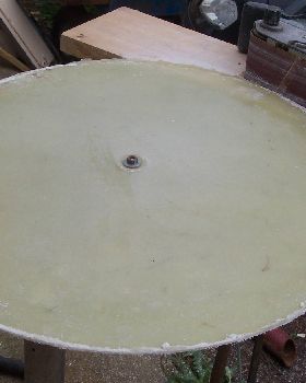 Rim on jig to get true outside diameter.