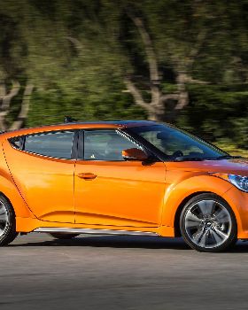 2017-Hyundai-Veloster-Turbo-front-three-quarter-in-motion-07
