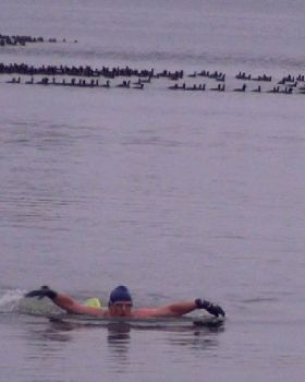 Air 30-32F (-1 to 0C), Water 42.8F (6.0C) Swim in Speedos