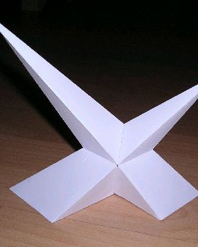 compound of two different size asymmetric pyramids