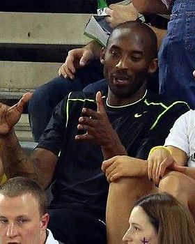 514275-kobe-bryant-chats-with-steph-rice