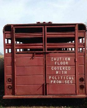 funny-cow-truck-poop-sign-politics