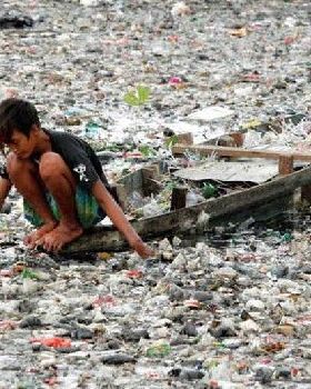 Citarum River Indonesia Kid Picking Thru Rubbish