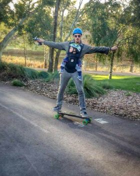 baby riding electric skateboard