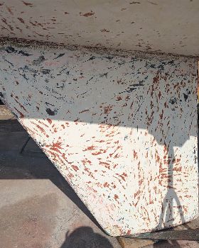Scraping antifoul from hull