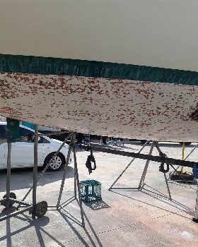 Scraping antifoul from hull