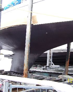 Morning Bird keel, pre soda blast. It is bolted on.