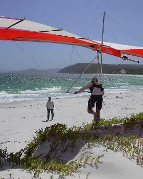 Shaun stepping off another dune
