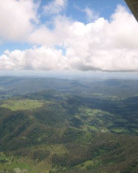 Hang gliding at cloud base