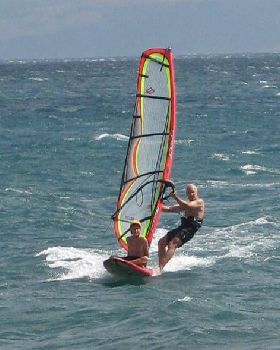SUP sailing with passenger