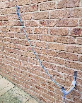 storing board outside on wall brackets