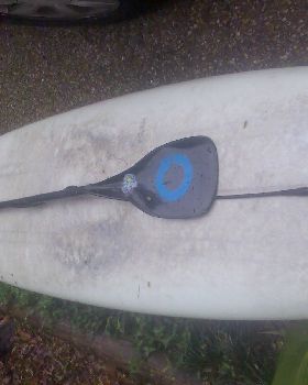 hold paddle to board