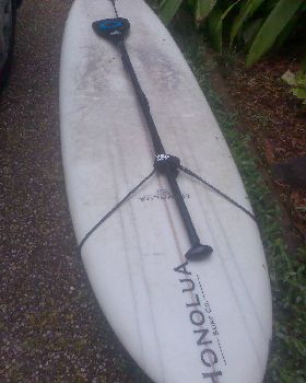 hold paddle to board