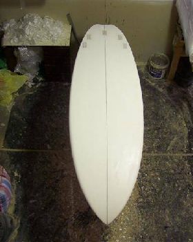 brookos shaped 8'6 showing box inserts