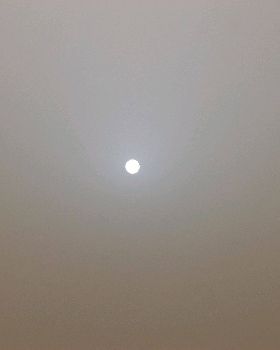 Dust storm afternoon sun