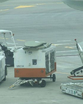 Our boards on the baggage cart ROOF!!