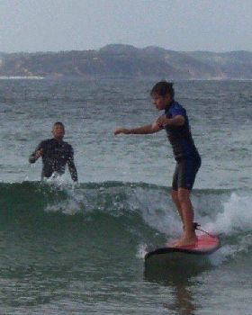 James & Gra surfing