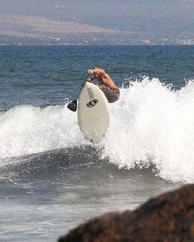 Noah in Hawaii - playing on the backwash