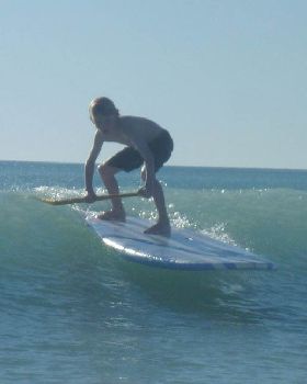 robbie surfing