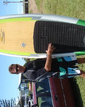 Phil with his 8'10" x 33.5" x 150 ltr timber deck Fun Board SUP