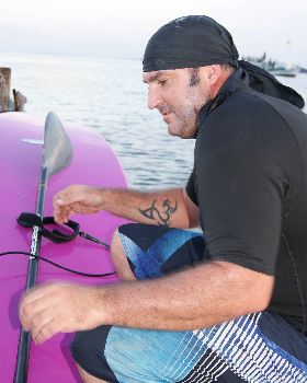 Captian Hues Angore on the helm