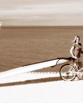 Surf board, SUP board or Kayak with a bike.