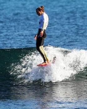 Georgia Young surfing surfer
