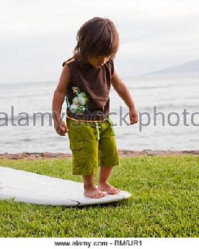 young-boy-hang-ten-surfboard-bm6jr1