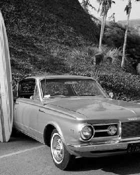 1965-plymouth-barracuda-front-three-quarters-view-with-surfboard