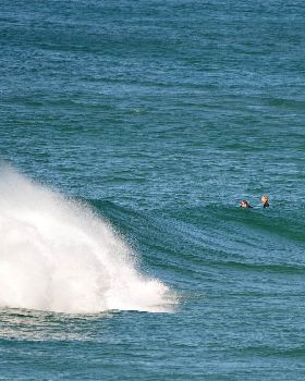 Surfers at Dreamtime Beach