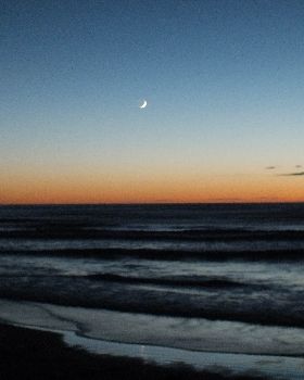 Crescent moon/sunrise over mak