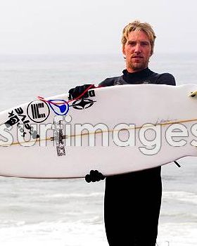 eli-mirandon-holding-surfboard