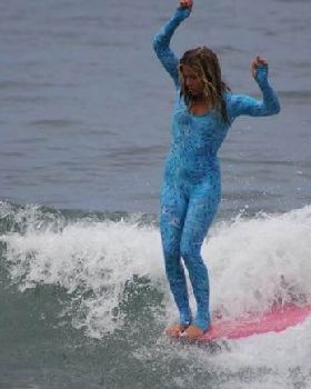Francesca-Seely-hanging-ten-Malibu photo-Mitt-Seely-650x433