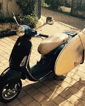 Vespa with surf rack