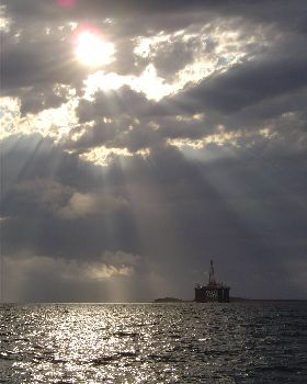 Silvery clouds over the rig