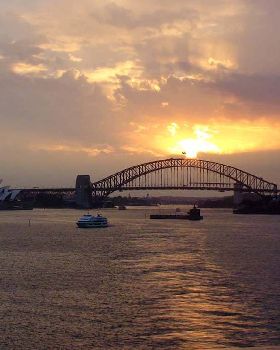 Early sunset behind Sydney Harbour Bridge