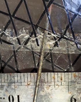 black thread exposed with small tears